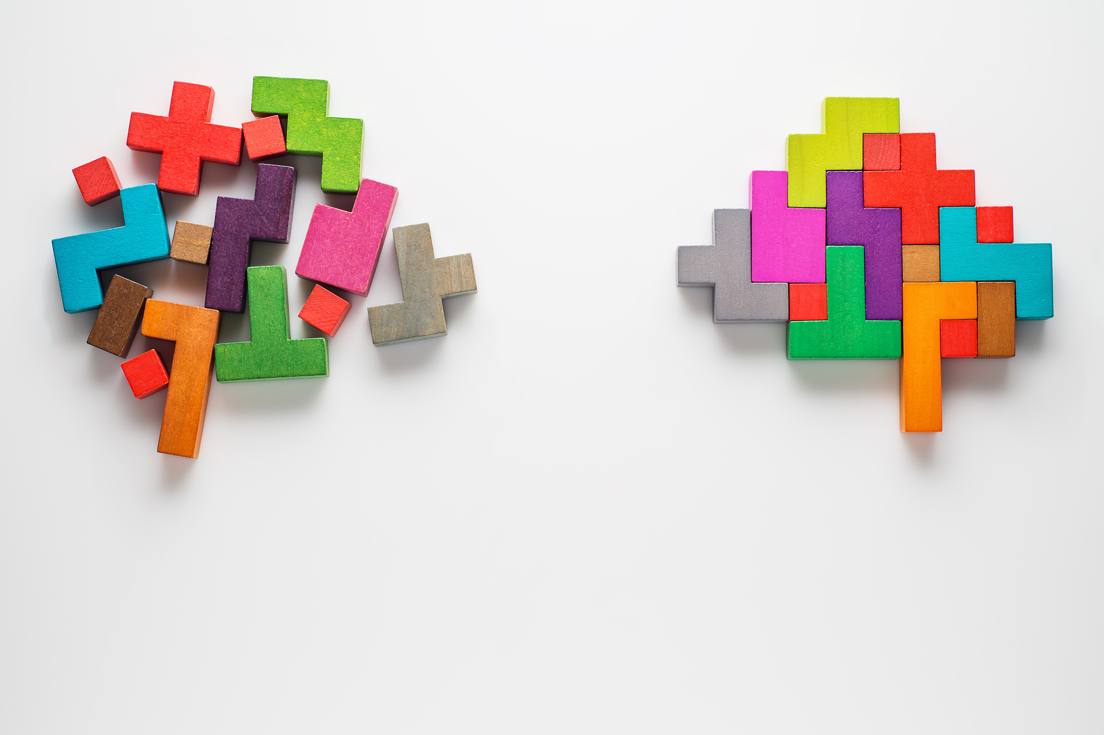 coloured blocks in the shape of a brain to suggest order and disorder linked to mental health marketing in the workplace